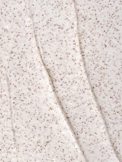 Texture granuleuse du gommage cuir chevelu